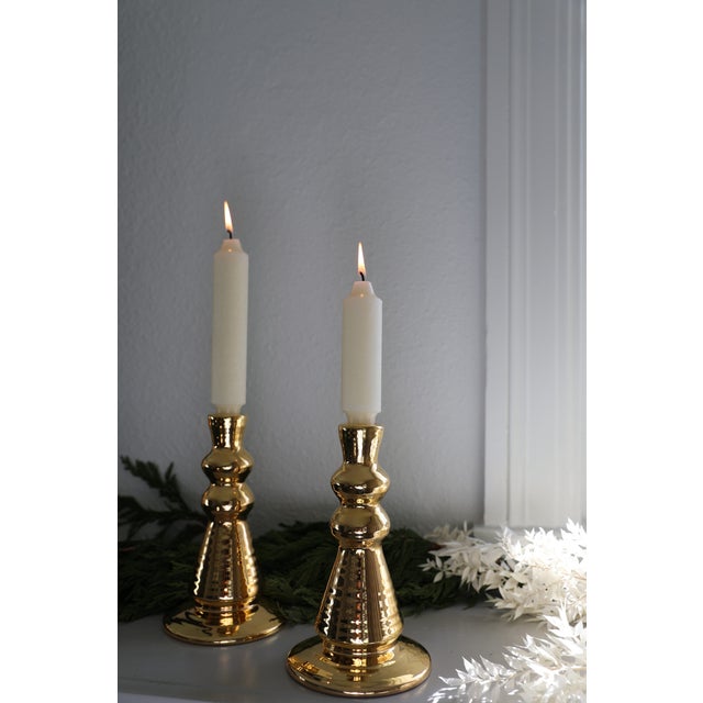 This extra-large handcrafted ceramic candleholder is enhanced with a ribbing effect created by the potter's own hand. It...