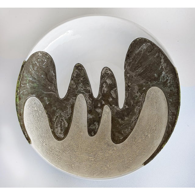 Large Modernist Wavy Abstract Ceramic Centerpiece Bowl Offered for sale is a large vintage ceramic centerpiece bowl with...
