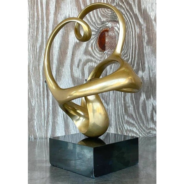 Add a touch of sophistication and artistic flair to your home with this stunning Vintage Boho Signed Abstract Brass...