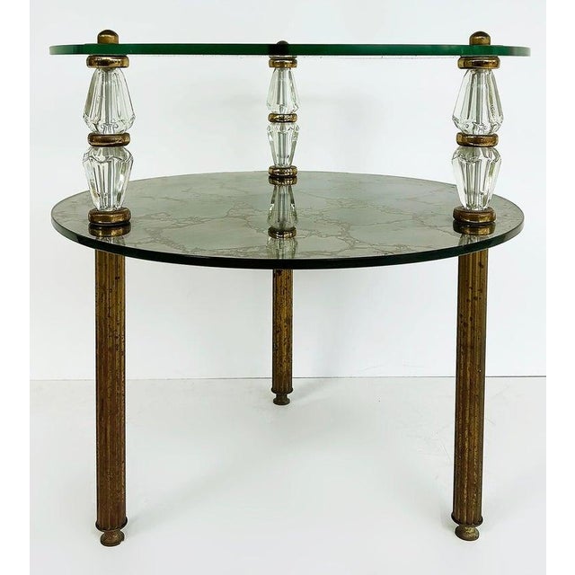 Hollywood Regency Brass, Eglomise Mirrored Side Table, 1950s, 2-tiered Offered for sale is a circa 1950s Hollywood...