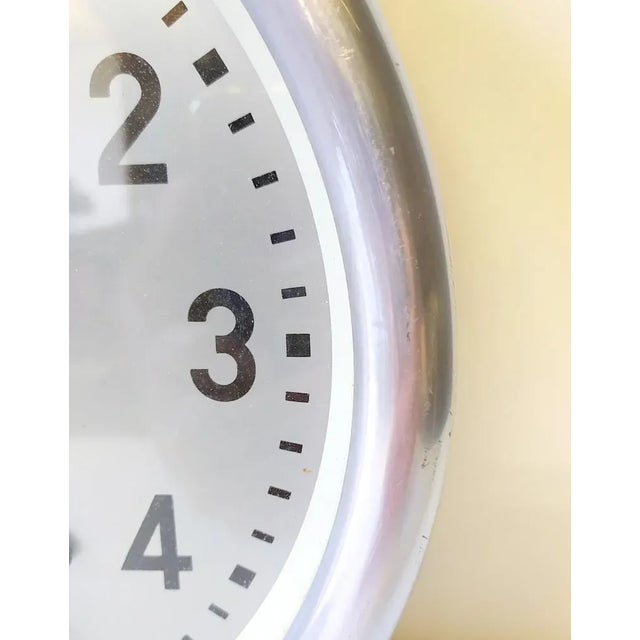 This is the round but rarer version of the square station clock. Before it was detached from the wall, it worked. The...