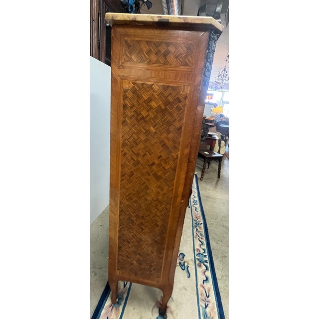 Very nice turn of the century French inlaid highboy dresser with seven drawers and lovely marble top. All original...