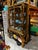 Up for consideration is a stunning vintage gilded gold ornate display cabinet with glass shelves. This is beautiful piece...