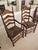 Two Hard Rock Maple Colonial Early American Ladderback Dining Arm Chairs withRush Seats