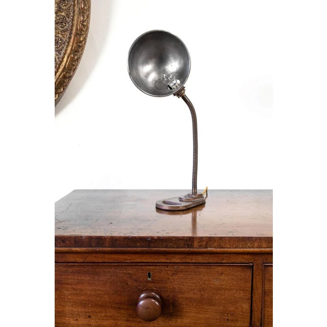 Original gooseneck industrial desk lamp. Cast iron base with flexible gooseneck stem and spun steel shade in it's original...