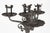 Beautiful wrought iron candelabra with 4 arms on 3 feet Intact and in excellent condition, there are some points of...