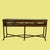 Handsome burnt bamboo console table in the Brighton style, featuring a rich dark-stained bamboo frame with woven cane...