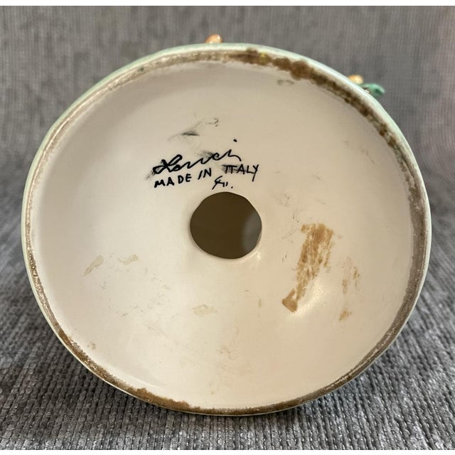 Beautiful and rare ceramic sculpture by the celebrated Lenci manufacture of Turin in polychrome glazed earthenware. The...