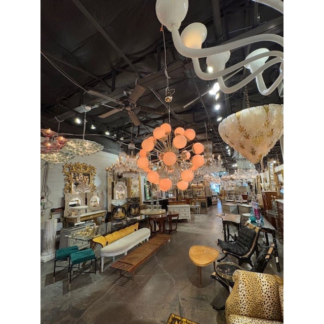 The Large-Scale Pink Murano Sputnik Chandelier is a stunning lighting fixture designed in a chandelier style. This fixture...