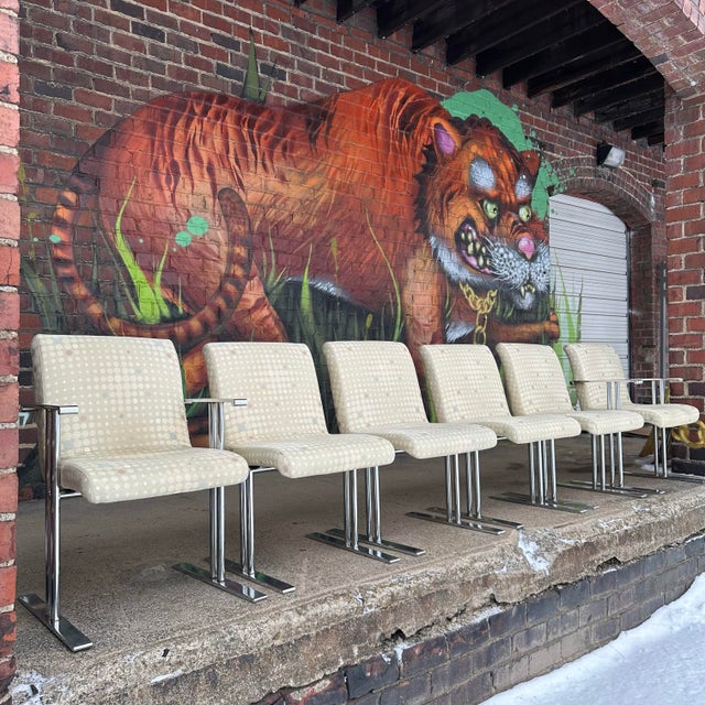 Mid century modern Set of 6 Directional Chrome Dining Chairs. This set of chairs includes 2 arm chairs and 4 side chairs....