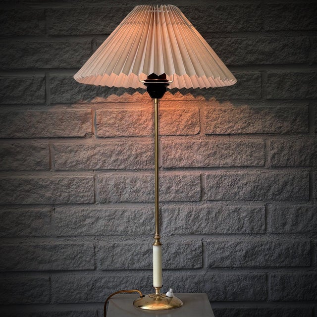 A beautiful modernist table lamp, model 31570, designed in the 1940s by bertil brisborg for the renowned swedish...