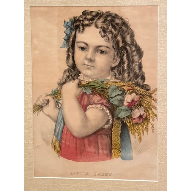 Original Currier & Ives hand colored lithograph titled, ”Little Daisy,” beautifully presented with a light beige textured...