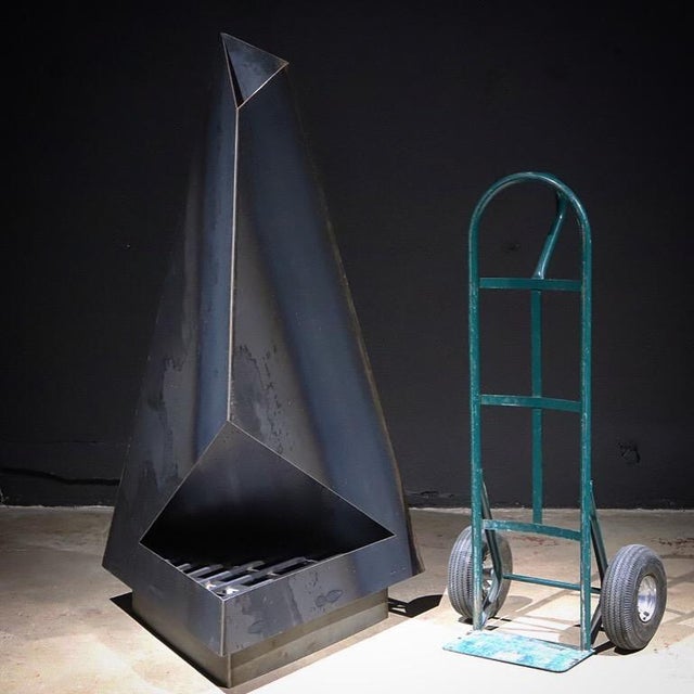 Not your normal chiminea or fireplace. This high design, raw steel sculptural piece will make a statement in any outdoor...