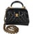 Intrinsically Chanel, the medium Coco top handle bag was named after the maison's founder. Introduced in 2015, the bag...
