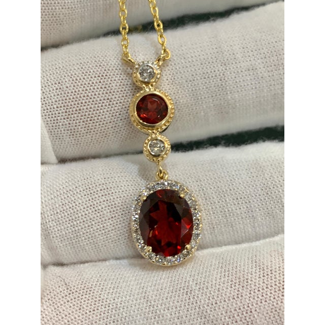 2010s 6 Carat Oval Shape Garnet and 0.6 Carat Diamond Necklace in 14 Karat Yellow Gold For Sale - Image 5 of 18