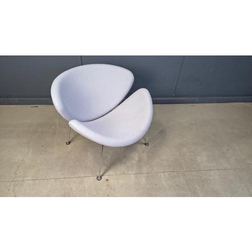 A timeless 'orange slice' lounge chair which was designed in the 1960s by pierre paulin and produced eversince by...