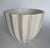 1950's white glaze ribbed ceramic Art Deco style cachepot planter. Signed on bottom Haeger USA.