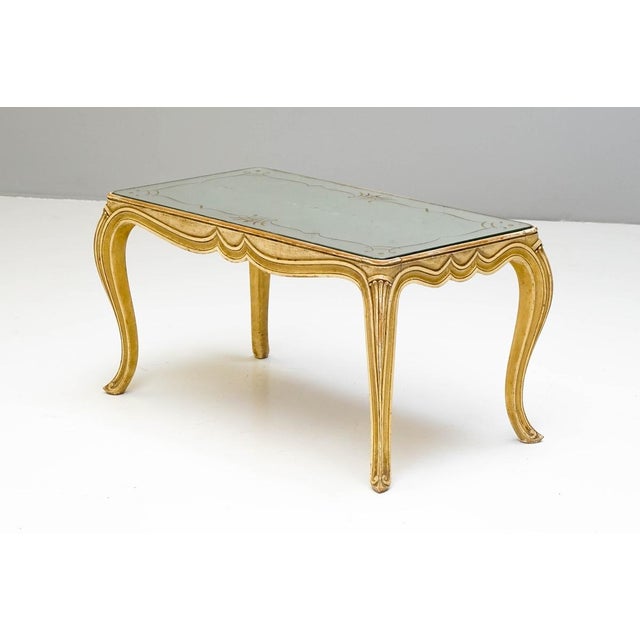Decorative cream painted coffee table on cabriole legs with original aged mirror glass top. Some scratches visible. France...