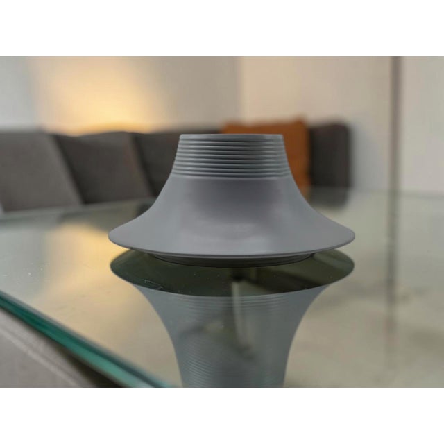 A rare ‘Vesuvio’ vase designed by Angelo Mangiarotti for Gabbianelli in the 1970s. Crafted in matte white ceramic, its...
