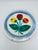 This colorful decorative plate is a De Simone. This Italian designer is known for colorful, whimsical pottery. In my...