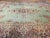 Discover the unparalleled elegance of this exquisite oversized vintage Persian Kerman rug, a truly rare find dating to the...