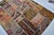 1950s Vintage Handwoven Turkish Patchwork Kilim Rug With Eclectic Tribal Motifs For Sale - Image 5 of 9