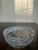 Stunning vintage cut crystal bowl featuring an intricate geometric starburst pattern and dramatic sawtooth rim. Richly...