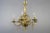 Magnificent Belgian twelve-light brass and bronze chandelier, early 20th Century. This chandelier has six large arms...