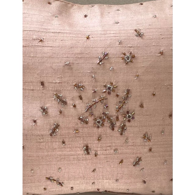 Add a touch of elegance to your home decor with this stunning hand-beaded silk dupioni pillow cover. The rectangular shape...