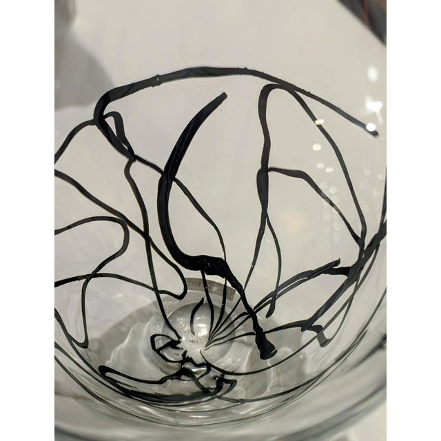 Clear art glass vase with expressive black graffito linework. Large scale, sculptural presence