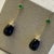 Created in 18 karat yellow gold Black Onyx Drops 20 carats approx. Emerald cabochons 0.50 carat approx. Diamonds 0.10...