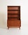 Teak structure with four adjustable shelves at the top and a lower compartment closed by two sliding doors with an...