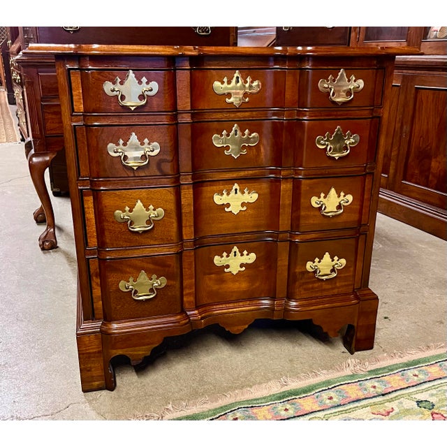 Classic block front chest by Councill Craftsmen. Solid mahogany construction, four graduating block front drawers with...