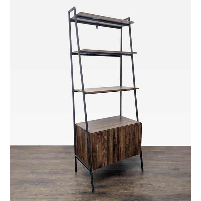 This Walker Edison bookshelf features a stylish industrial ladder design with three open shelves for displaying books and...
