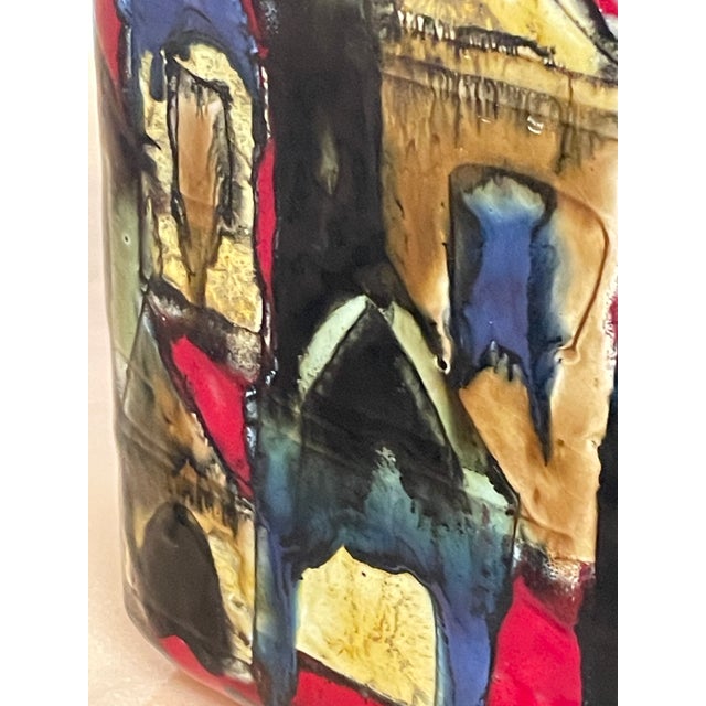 Glazed ceramic vase with a distinctive triangular shape by Italian designer Elio Schiavon, dating back to the 1960s and...