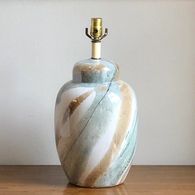 Offering a beautiful mid-century marble-glazed Shetland China ginger jar table lamp from Greenspan & Co., Philadelphia....