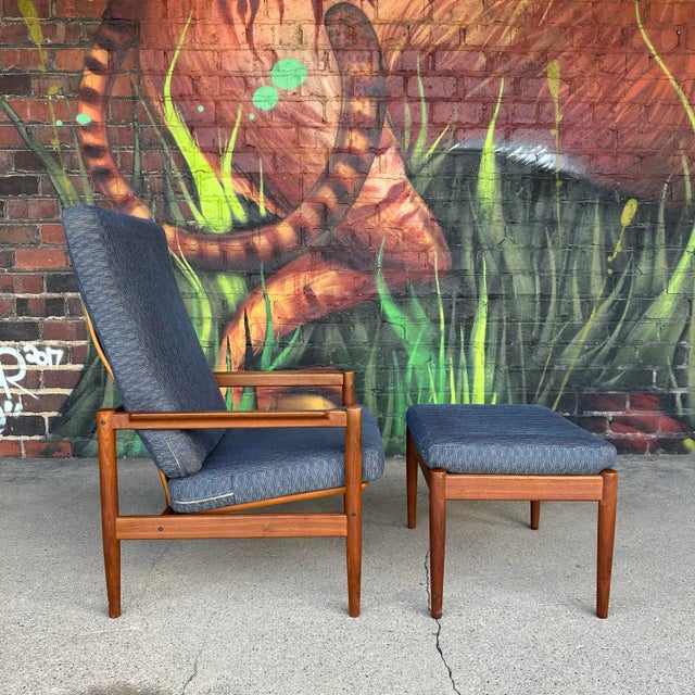 Mid-century Danish, modern lounge chair and ottoman by designers Børge Jensen & Sønner for Bernstorffsmide Møbelfabrik....