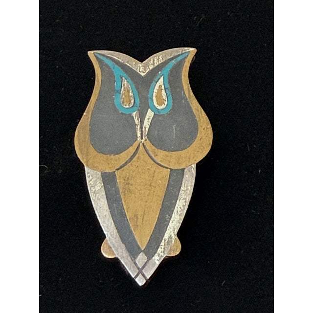 A striking piece of mid-century Mexican wearable art. This authentic vintage modernist owl brooch/pendant was expertly...