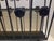 Unusual and very heavy solid wroth iron magazine rack/holder. Flower accents on both sides. Two sections to hold magazines...