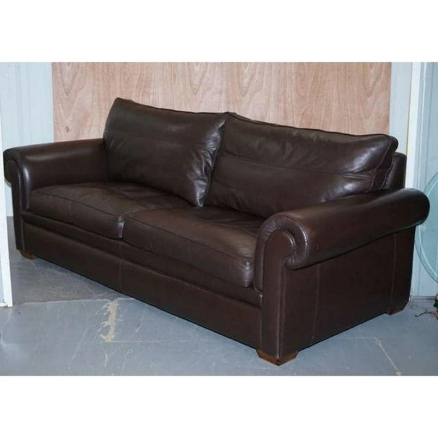 Divine duresta garrick 3 seater dark brown leather sofa. Giving you absolute comfort with feather-filled back cushions and...
