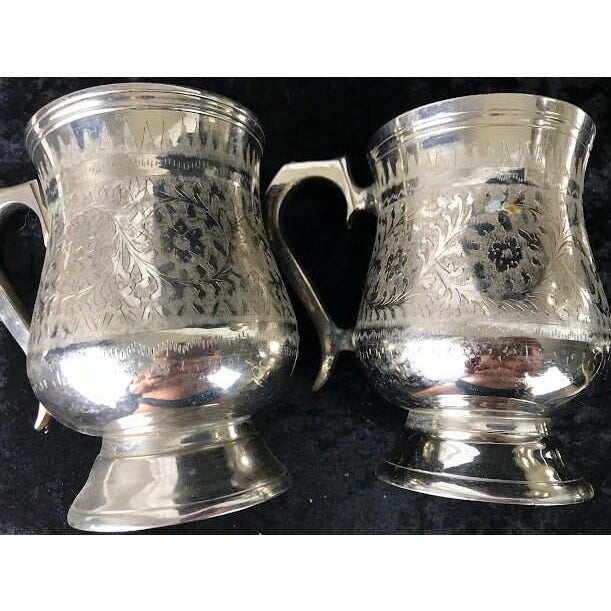 An exquisite late-19th to early-20th-century Anglo-Indian silver-plated beverage service, showcasing masterful...