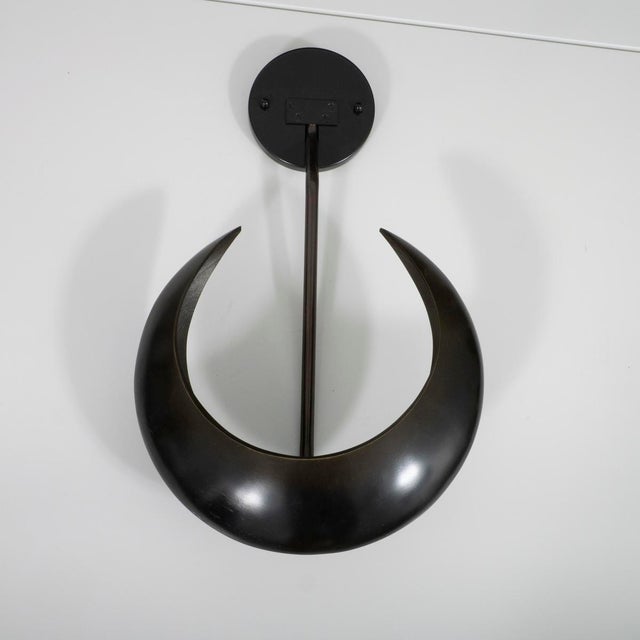 Pair of vintage crescent moon wall sconces by Marbro with antique bronze finish.