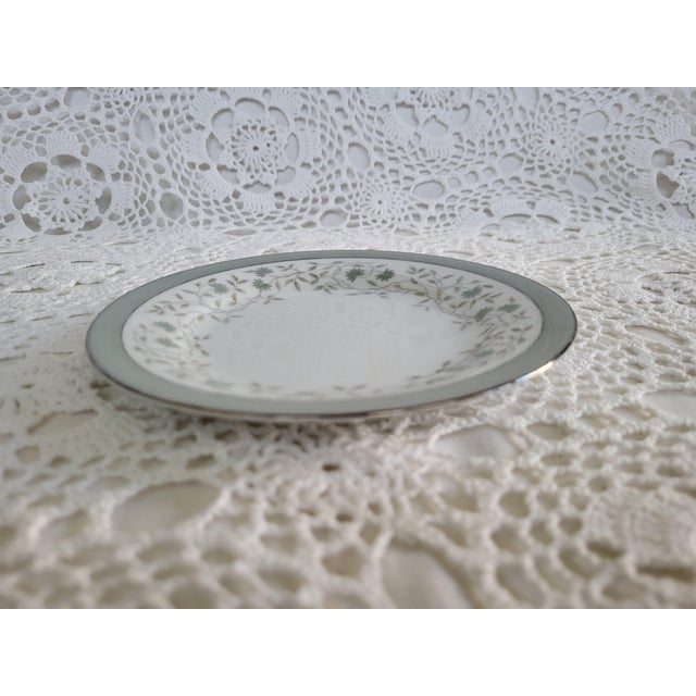 A small plate by Noritake China in the Meredith pattern. The design and colorway is timeless and perfect for many types of...