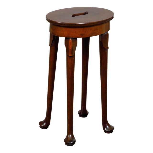 19th-Century English Walnut Stool with Hand-Cut Central Handle and Pad Feet For Sale