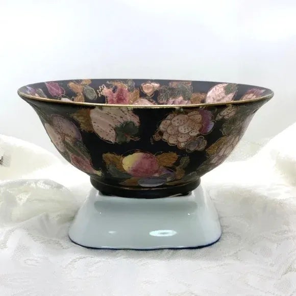 This Bowl is a fusion of artistic elements, including traditional Chinese motifs, crackle glaze technique, and ornate gold...