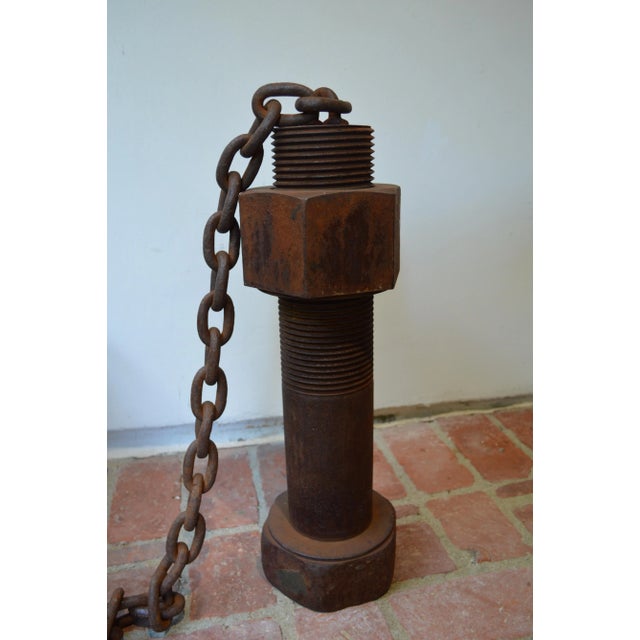 Unique, heavy vintage iron nut & bolt. The multihued delights of rust in this architectural piece adds character and...