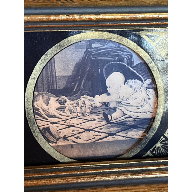 A beautifully aged antique devotional triptych, featuring a central hand-painted religious scene flanked by two hinged...
