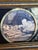 A beautifully aged antique devotional triptych, featuring a central hand-painted religious scene flanked by two hinged...