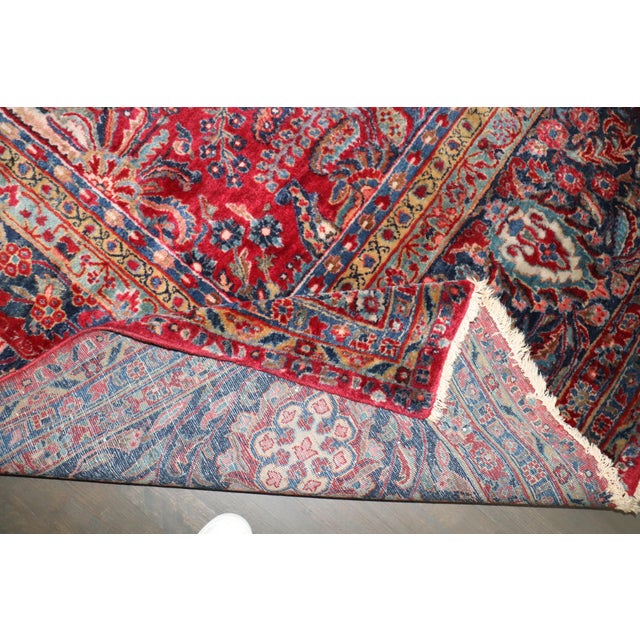 A stunning full pile antique Persian Sarouk rug in mahogany red and royal blue. 12'1'' x 15'2'' early 20th century