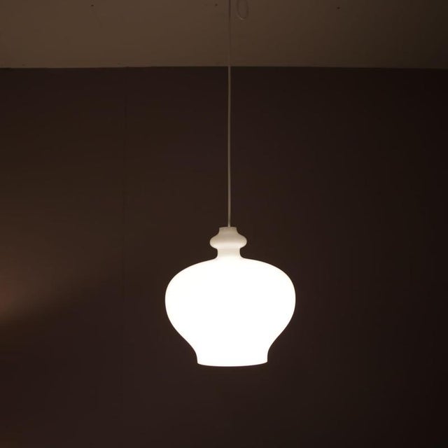 An elegant hanging lamp designed by hans agne jakobsson, manufactured by markaryd in sweden in the 1960s. A highly...